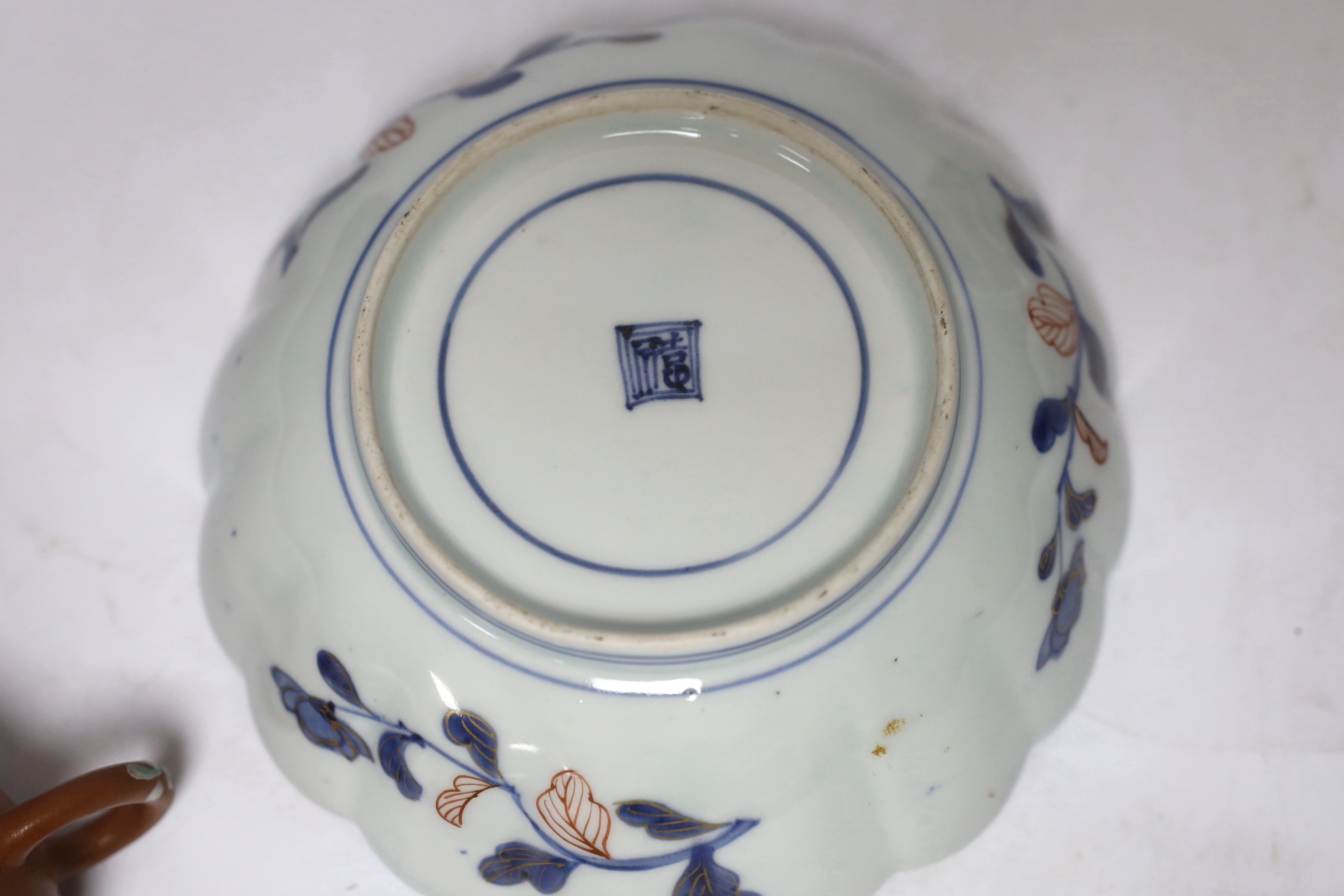 A Chinese enamelled yixing teapot and cloisonné bowl together with a Japanese Imari bowl and a Satsuma seated figure of a Buddhist monk, tallest 14cm